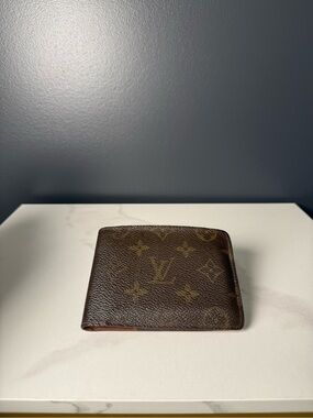 Louis Vuitton Monogram Canvas Wallet in Brown and Gold